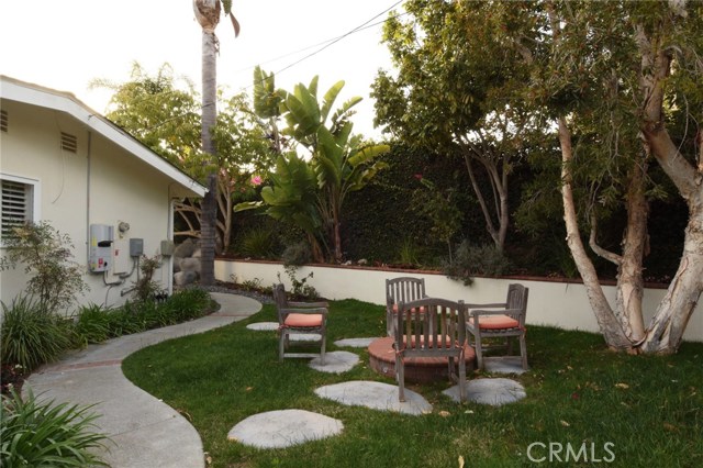 Another view of the yard with firepit!