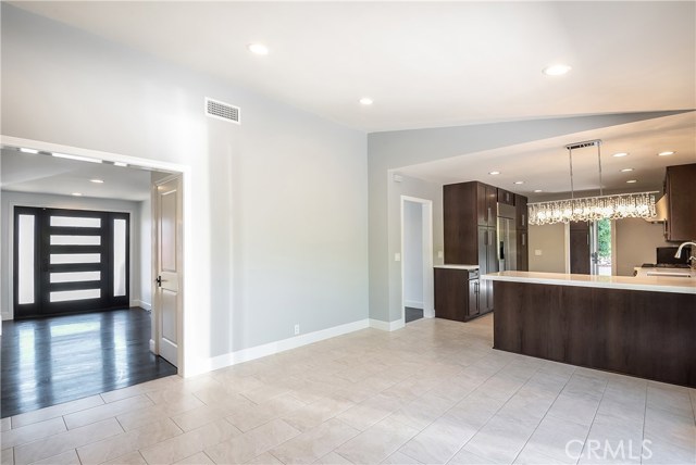 Kitchen/Dining room looking onto foyer