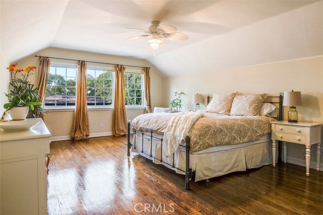 The secluded master suite is quite spacious and features his and hers closets and a full bath