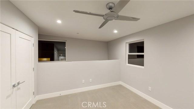 3RD LEVEL 5TH BEDROOM WITH CEIING FAN AND RECESSED LIGHTING
