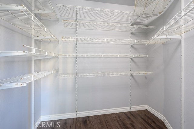 Ample storage in walk in closet