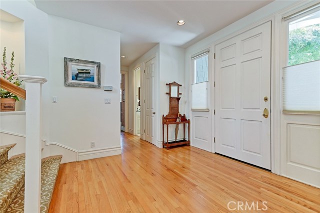 Entry foyer with hardwood floors throughout main level.