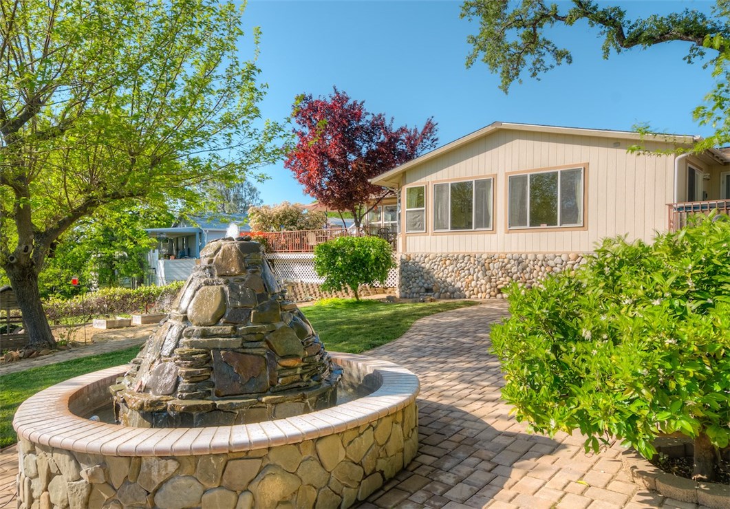 From Fountain Looking up towards house with golf course behind you.