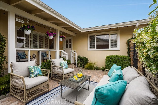 Relax on this beautiful front patio. Enjoy all the landscaping here.