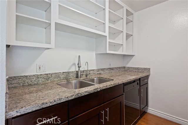 Upgraded counter top, cabinets and sink.