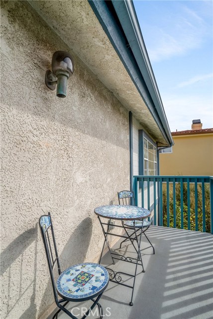 BACK HOUSE UPSTAIRS PATIO FACING WEST.