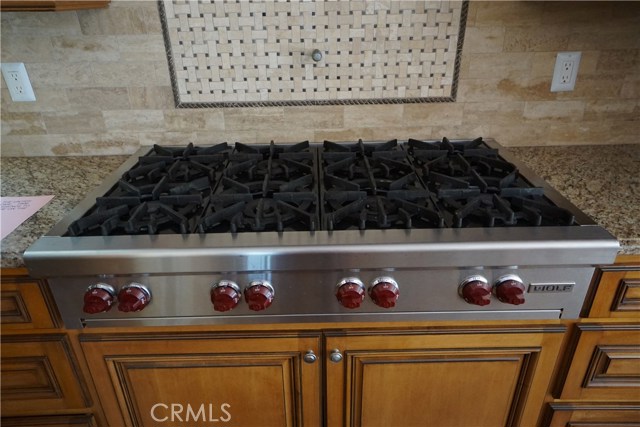 Stainless gas 8 burner stove top for the cook in the home.