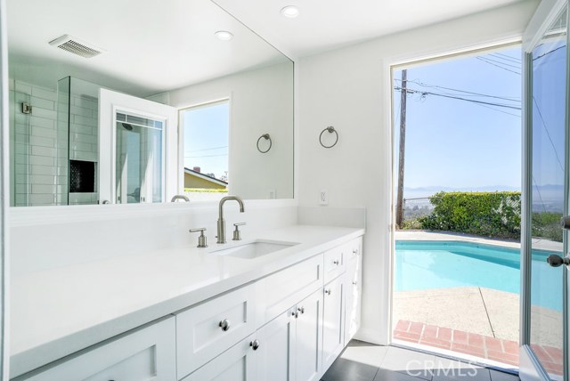 Master Bedroom - 3/4 attached bath with door leading to pool