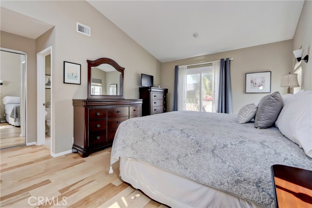 This generous master suite boasts newly added hardwood floors and his and hers closets.