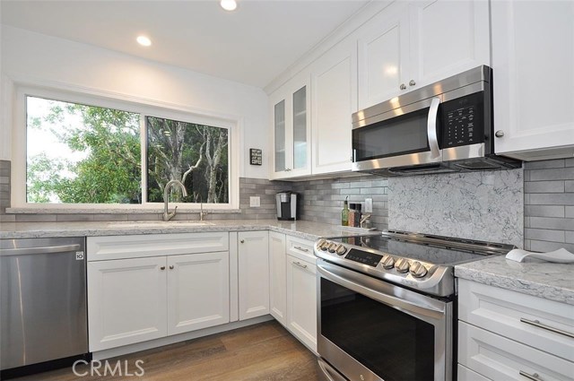 Remodeled kitchen with stainless steel appliances