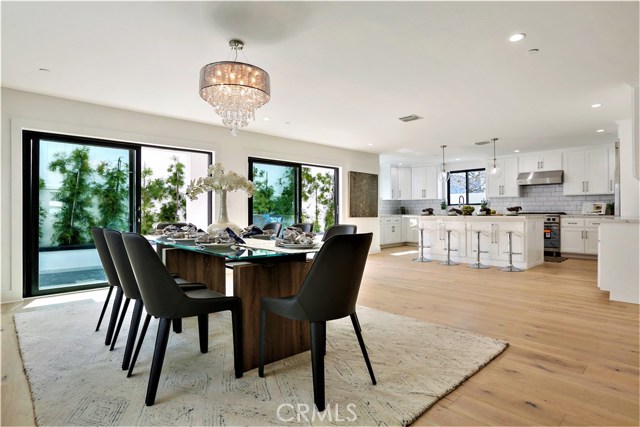 The entire home has High Quality Anderson Windows throughout, flooding the home with light. Adjacent to the Kitchen and Dining Area is a Wall of Sliding Glass Doors to the Rear Yard Area blending the interior and exterior for Barbeques, Seating and Relaxing.