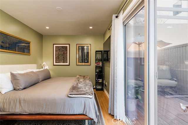 The master bedroom opens up to the private south facing patio.
