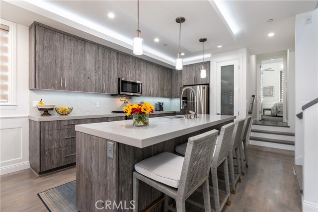 Plenty of storage in the custom cabinets and walk-in pantry