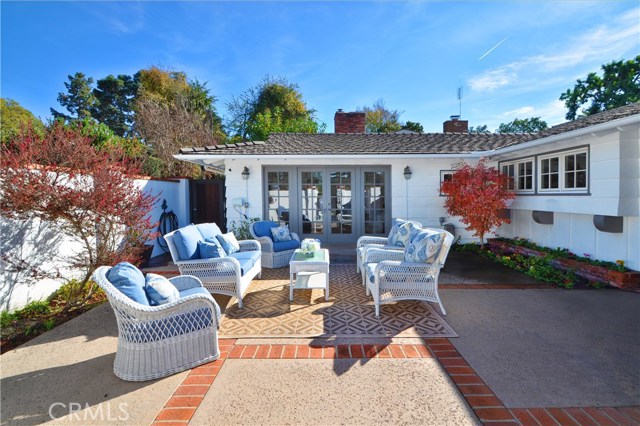 French Doors from Front Courtyard Leads to Family Room