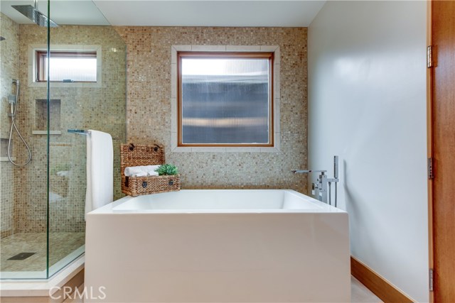 The master bath is your personal spa and offers a soaking tub and walk in shower that lead to a large walk in closet.