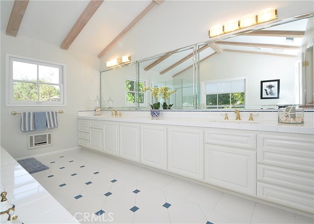 Master Bathroom Features a Vanity with Twin Sinks