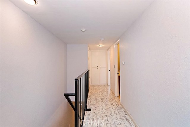 Upstairs Hallway, Leading from Primary Bedroom to Second Bedroom & Hallway Bathroom