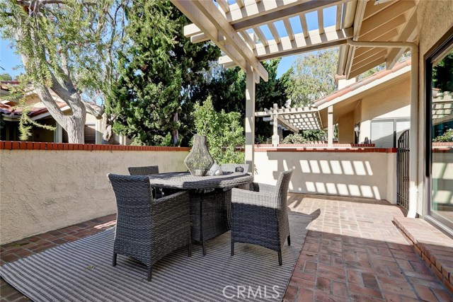 Backyard patio with plenty of room to entertain or room for the kids to play!