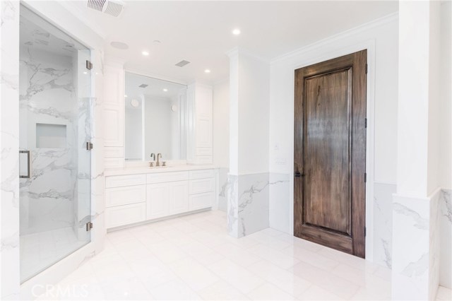 Duel sink and vanity areas on either side of the master suite bathroom