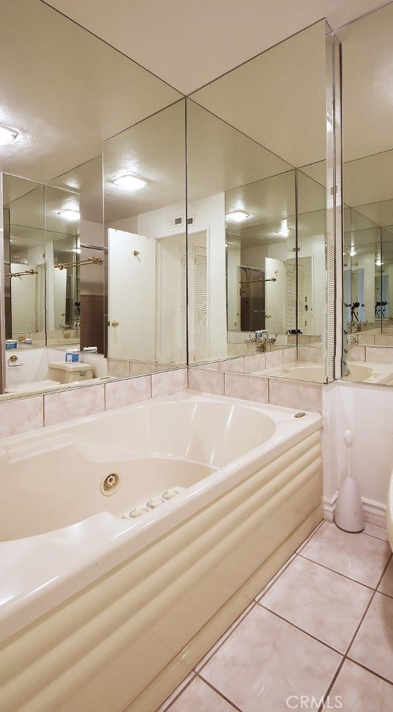 Separate Bath and Toilet Area in Master Bathroom