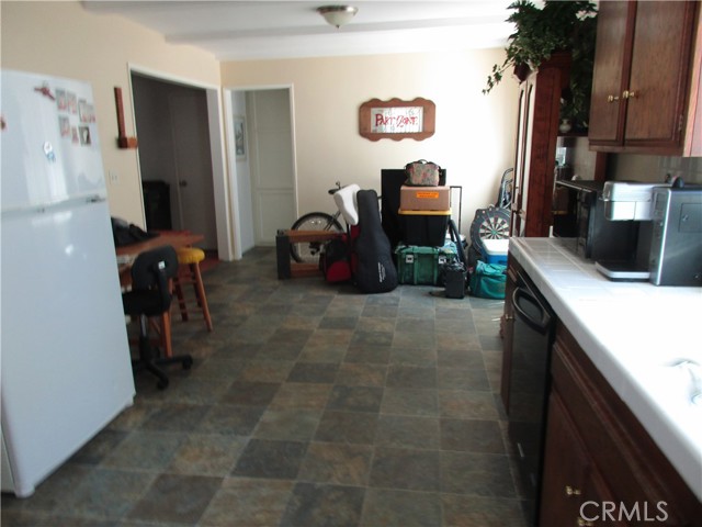 Unit #1 Looking from kitchen towards dining area.