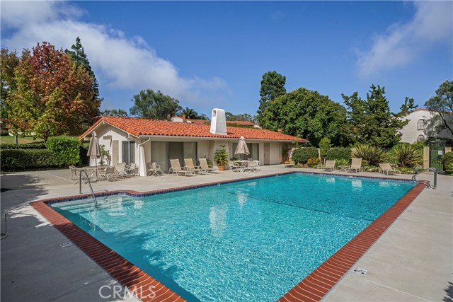 Large heated pool and club house are right out your gated patio.