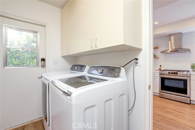 Laundry room adjacent to kitchen