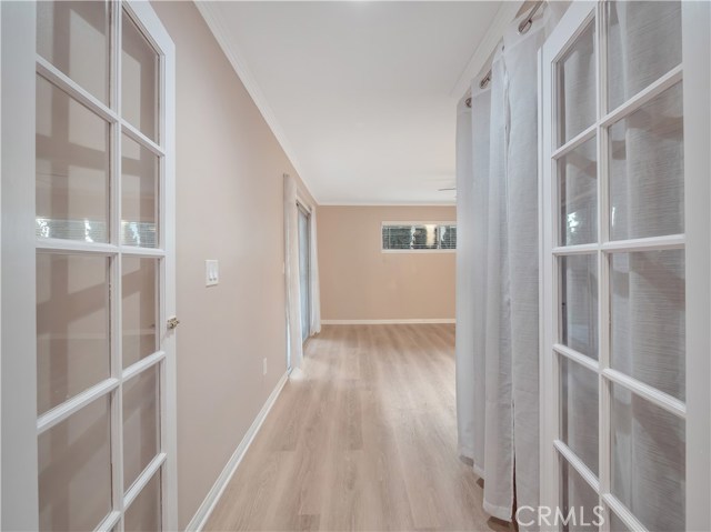 Vanity doors leading to the large master bedroom to keep the house open and bright