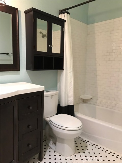 Bathroom with New Toilet, Bathtub and Vanity.