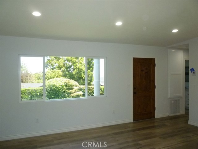 View of the front door from the living room.