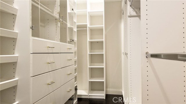 Master closet room!--There are also another smaller walking closet and 2 smallest walking closets besides 3 sliced door closets with own bedrooms.