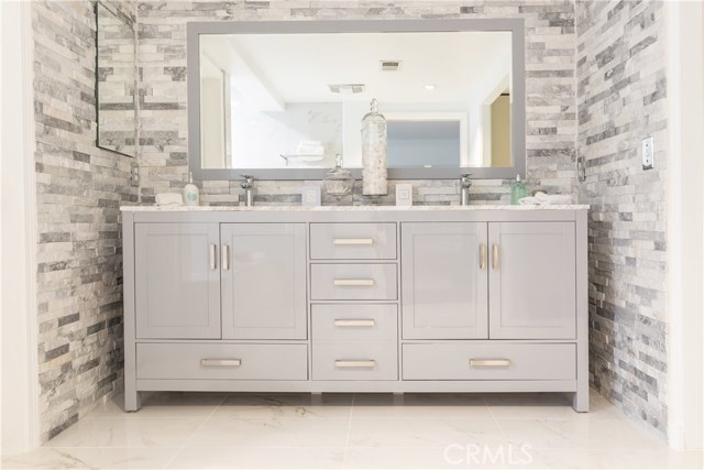 Master bedroom 1 with double vanity and Hansgrohe faucets