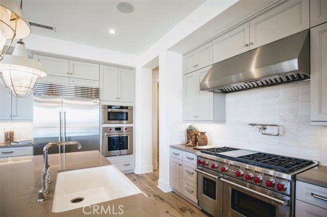 Wolf & Subzero appliances allow you to easily create wonderful meals for your favorite people. Model home shown.