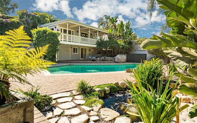 Detached 1 bedroom guest suite w/ full bathroom and 2nd level space with kitchenette and half bath.