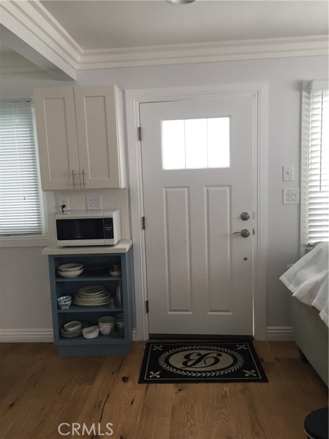 Downstairs unit entry with built in shelves