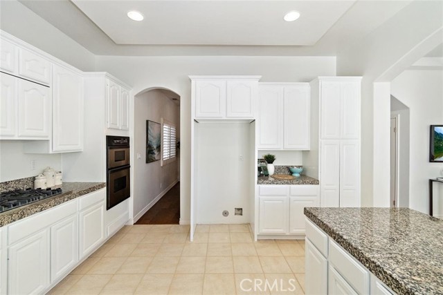 Kitchen with ample storage and pull out pantry shelving