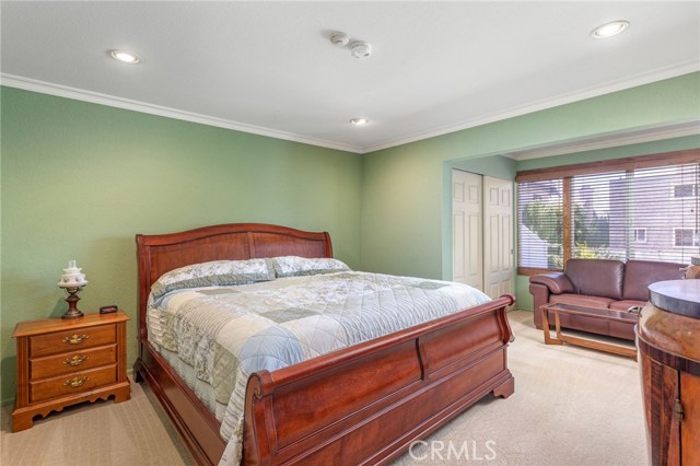 You can see the addition at the right of pic. Sitting area, large windows and closets on both sides of the couch.