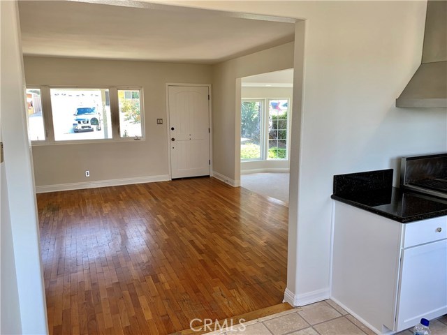 Kitchen looking toward living room/front door.