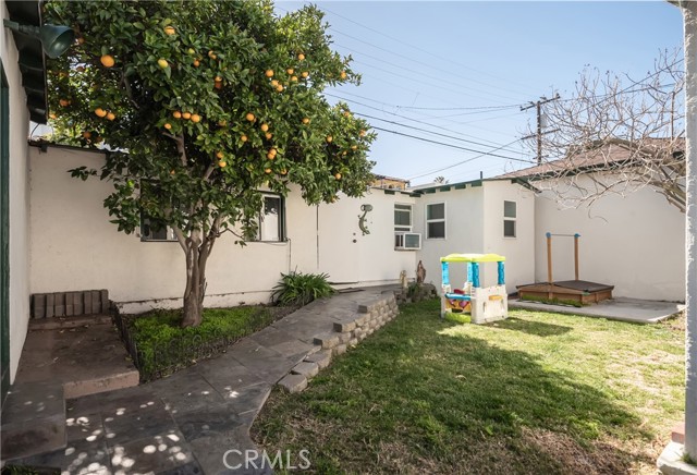 Backyard with orange tree and Bonus Unit