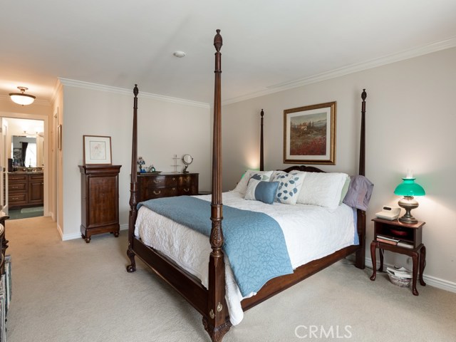 Another view of the master bedroom with master bath visible.