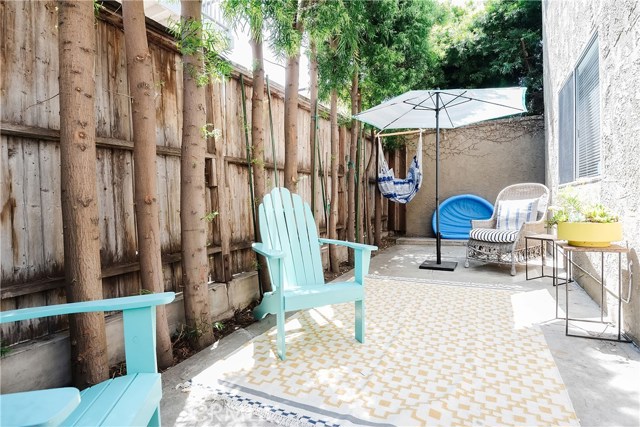 Private rear patio is accessed by French door.