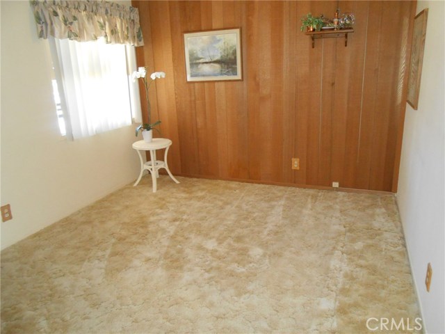 Bedroom #2 is located in Front of Home. Also with Vertical Blinds and Custom Made Valance and Fully Carpeted.