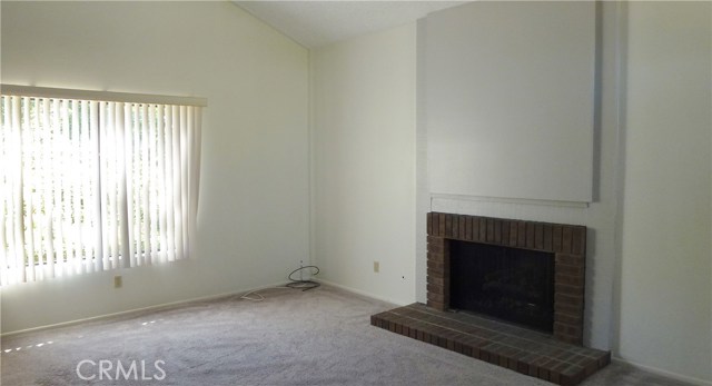 Living room looks onto backyard