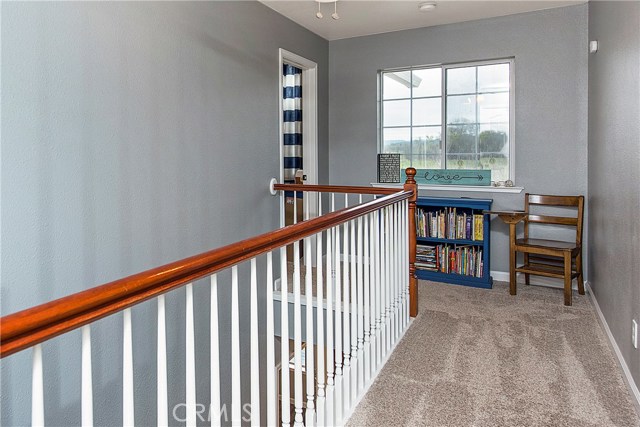 Upstairs landing area has large walk-in closet (not pictured)