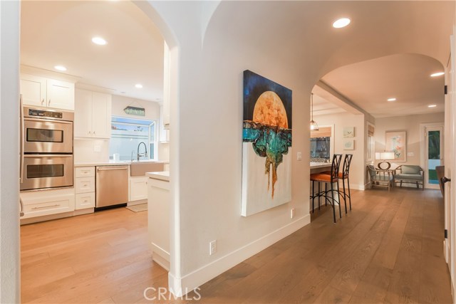 Kitchen and hallway to family room and backyard.