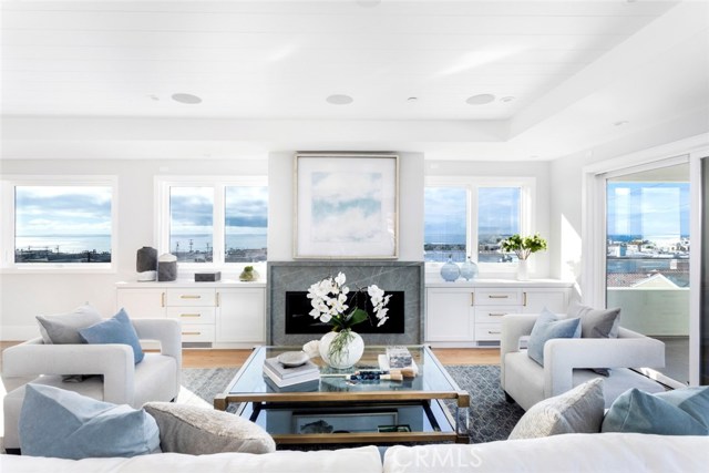 AMAZING~PANORAMIC OCEAN VIEWS, North Living room with built-ins on either side of the fireplace ...brass accents