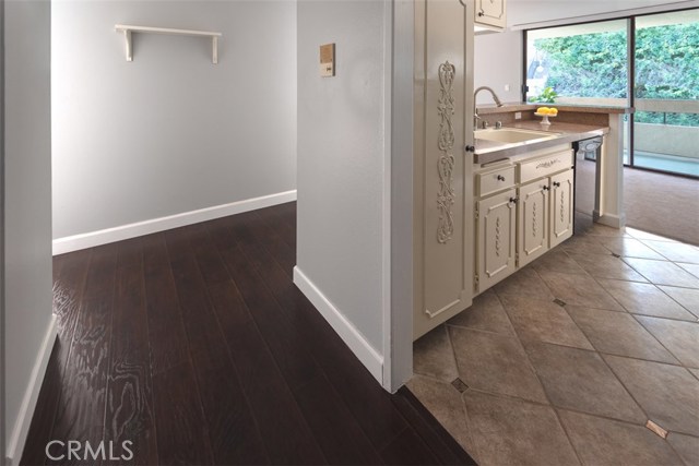 Entry - large closet to left, kitchen with pantry to right