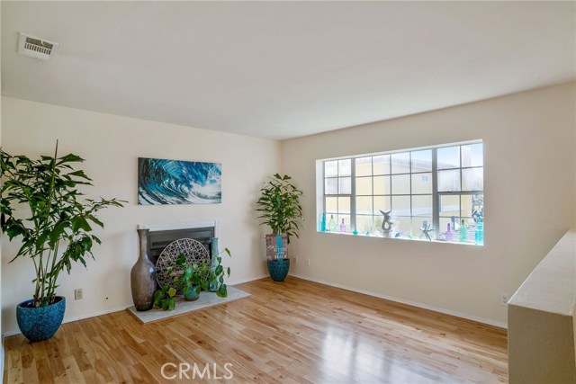 BACK HOUSE: UPSTAIRS LIVING ROOM WITH GAS FIREPLACE.