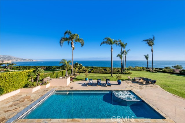 Gorgeous panoramic ocean views from the backyard. Large pool and jacuzzi with new automatic pool cover, fire pit, and garden.