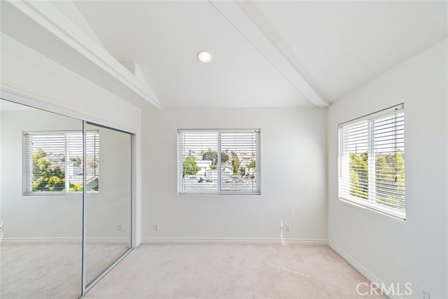 Bedroom with views north and east and high ceilings